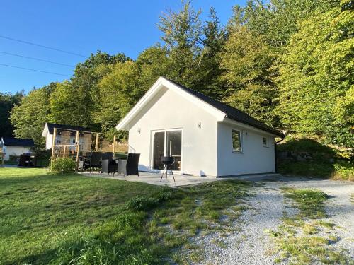 Smaller cabin in wonderful forest environment